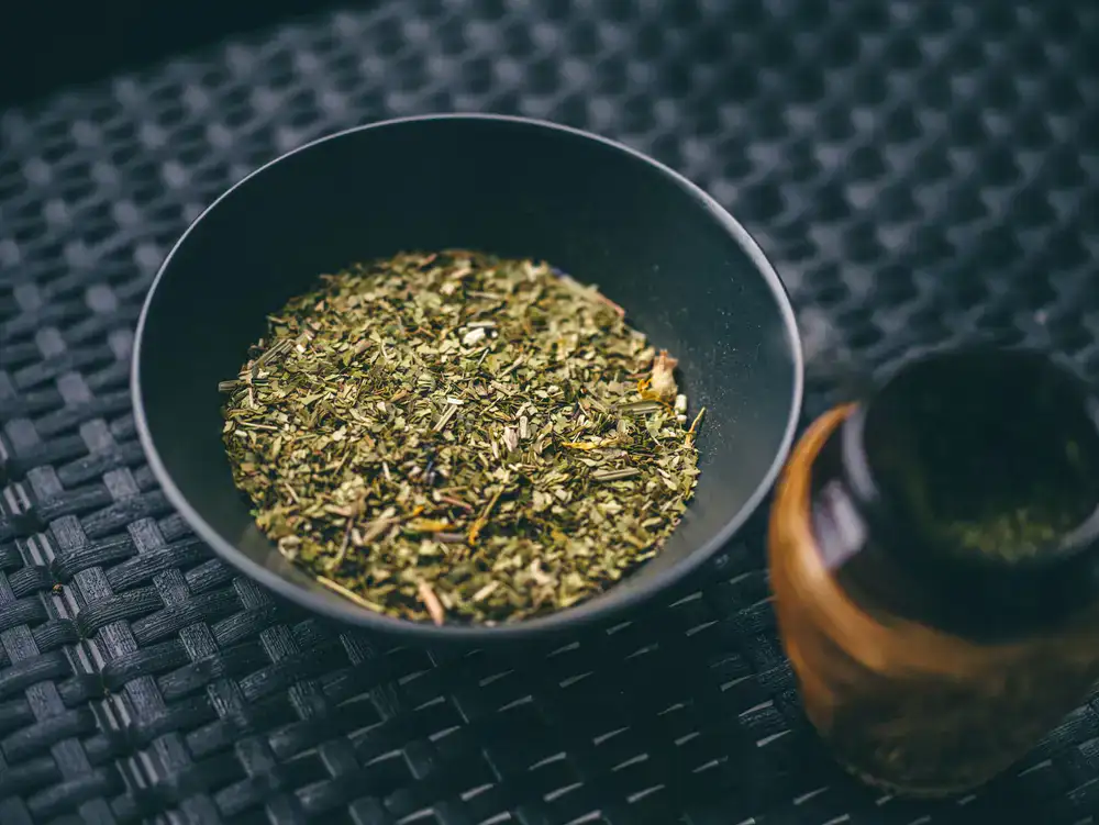 Loose leaf herbal teas in bowls